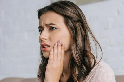 woman experiencing TMJ pain