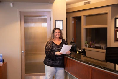 woman in the waiting room at Olympia Advanced Dentistry