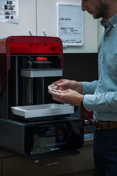 3D printer used to craft restorations at Olympia Advanced Dentistry